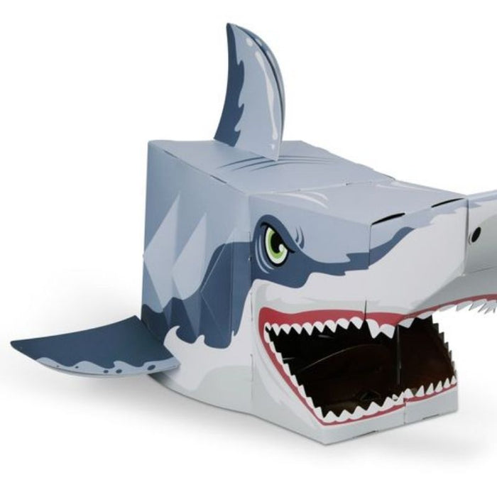 This fabulous grey, Shark 3D full-head mask craft kit is so much fun to make and then use to pretend to be a Shark. Suitable for children and even many adults to wear. This self-build mask craft kit encourages the love of arts and crafts -the fun starts with making the mask by putting tabs into numbered slots and seeing the head take shape. Once put together, it's great fun becoming your favourite Shark! Suitable for Age 5+. Pack Size: 36.5 cm x 28 cm.