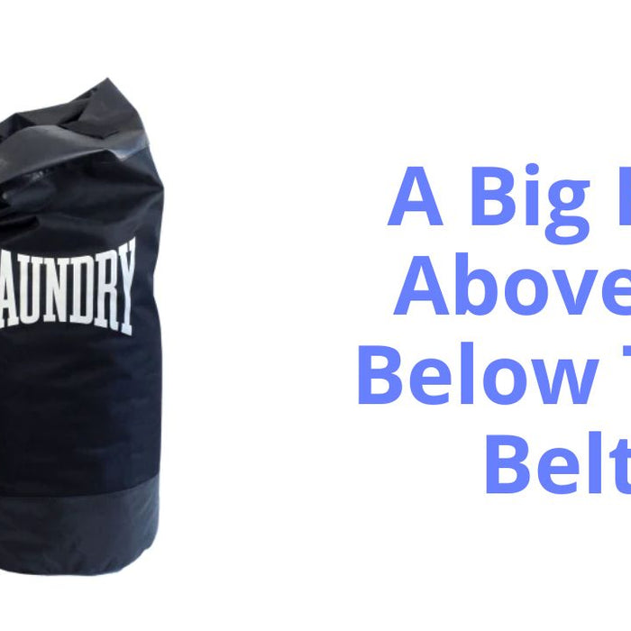 A long black bag shaped like a boxing punch bag with the word 'Laundry' written on it in a familiar boxing style. Alongside the image are the words 'a big hit above and below the belt'.