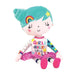 a large plush cool girl soft toy with green hair with rainbow and star slides in, a pink with white spots skirt and a cool  shirt with the words ' girls rule the world' on it