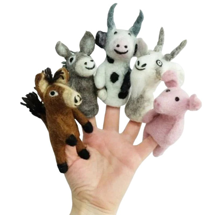 These delightful Barnyard Buddies felt finger puppets by The Winding Road come in a set of 5: 1 Horse, 1 Pig, 1 Donkey, 1 Cow and 1 Goat. Approximately 4" tall, 3.5" wide and 2" thick (varies depending on ear/tail/horn details). These handmade finger puppets are so much fun and made from 100% natural wool.