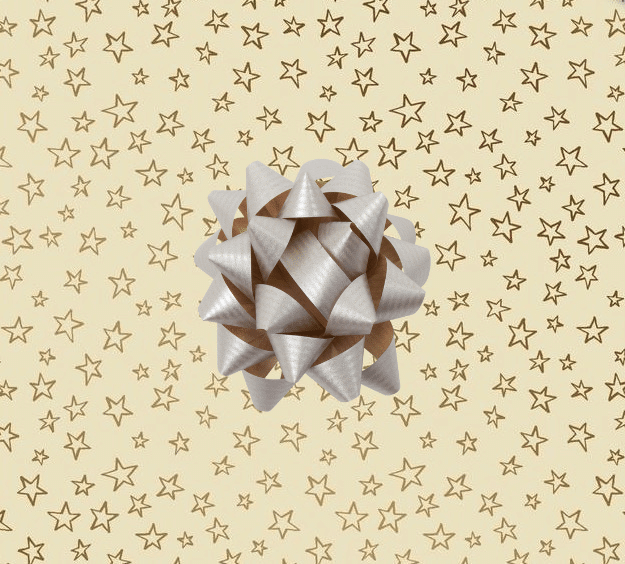 image of a square of wrapping paper, the paper is cream in colour with lots of gold stars