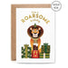 image of a greetings card with the words 'have a roarsome birthday' on it and a picture of a happy looking lion surrounded by virthday presents and biorthday cake with candles. Its a roarsome birthday card
