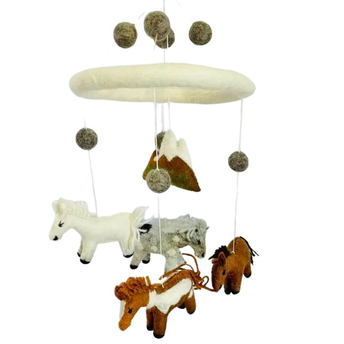 This delightful felt Farm Animals Mobile by The Winding Road is a beautiful addition to your Nursery. Featuring 4 differently coloured horses.  Approximately 20" tall and 7.5" wide.  Handmade from 100% natural wool. No chemicals are used during production.