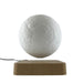 image of a levitating moon lamp. shows a 3d model of the moon levitating above a wooden block. 