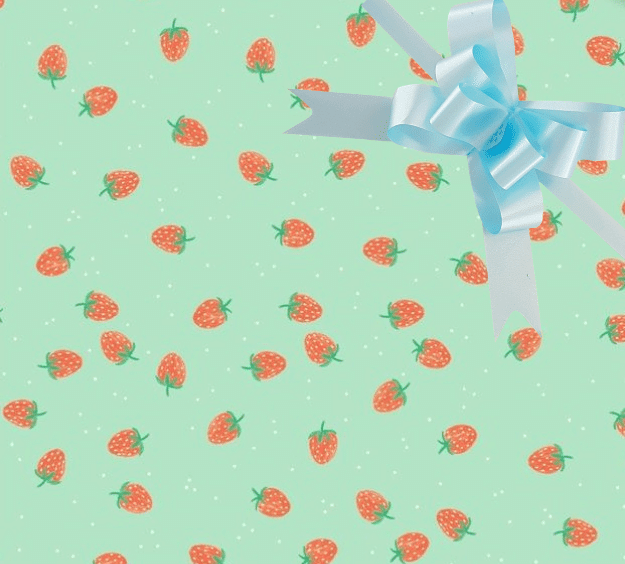 image of a square of wrapping paper, the paper has a light green almost mint background with lots of illustrated stawberries on it, in the centre of the gift wrap paper is a red paper gift wrapping bow