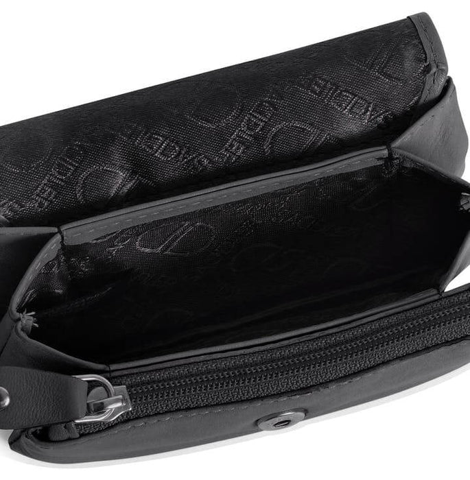 Image of a saddler lily flapover small coin purse in Black. It is made from leather