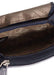 Image of a saddler lily flapover small coin purse in navy blue. It is made from leather