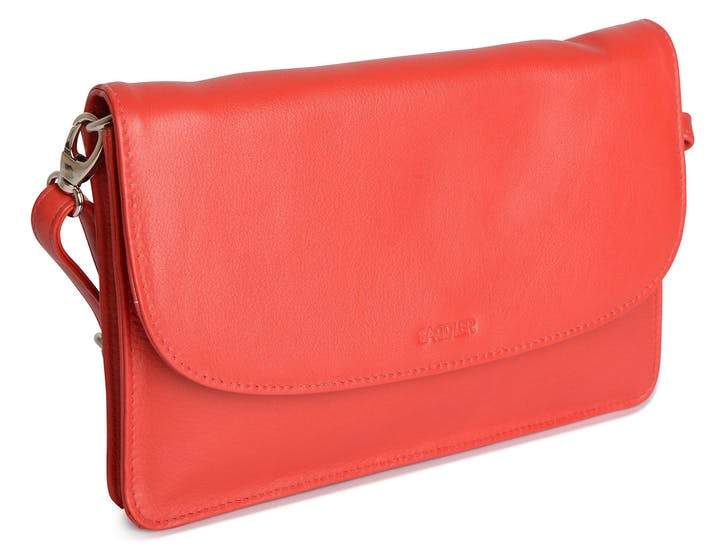 Image of a saddler olivia slim cross body purse clutch with detachable strap in red. It is made from leather