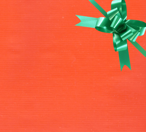 image of a square of wrapping paper, the paper is a solid orange kraft paper, in the corner of the gift wrap paper is a bright blue gift wrapping bow