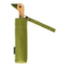 image of an umbrella whose handle is shaped like a friendly duck head, the umbrella is olive coloured