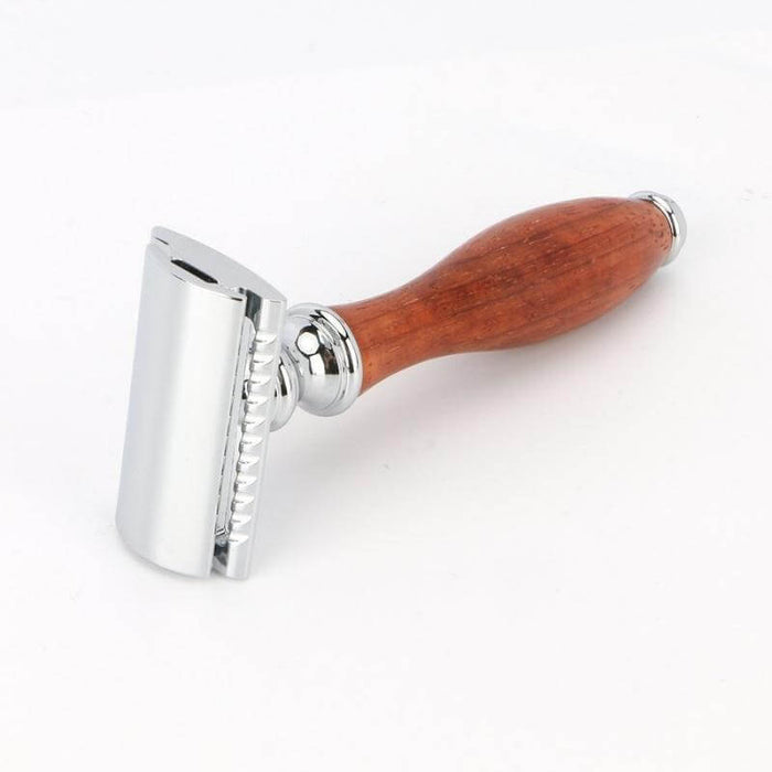 image of a traditional double edge shaving razor with red pear wood handle and chrome turned base and shaving head. 