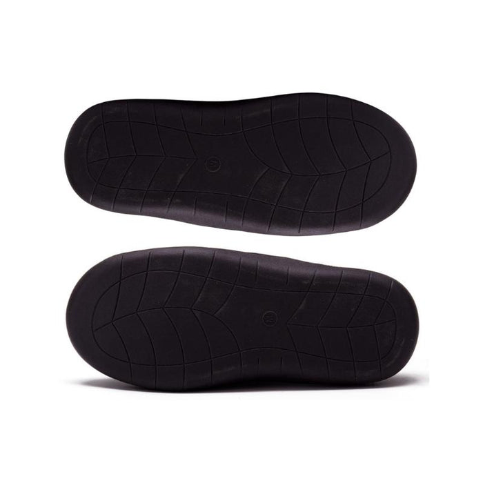 image of the sole/underside of a pair of mens memory foam slippers. the image shows the rubber sole.