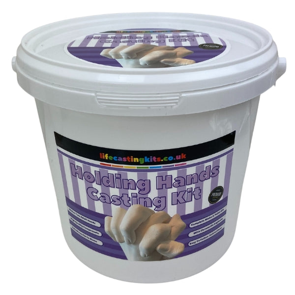 A holding hands life casting kit in a bucket style with a purple and white striped label design and the  logo lifecastingkits.co.uk at the top and holding hands casting kit underneath