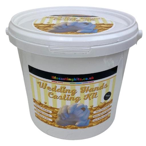 A holding hands life casting kit in a bucket style with a gold and white striped label design and the logo lifecastingkits.co.uk at the top and  Wedding Hands holding hands casting kit underneath