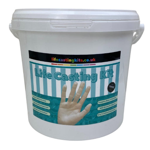 Life casting kit with white bucket and blue and white striped label featuring a white hand cast at the centre.