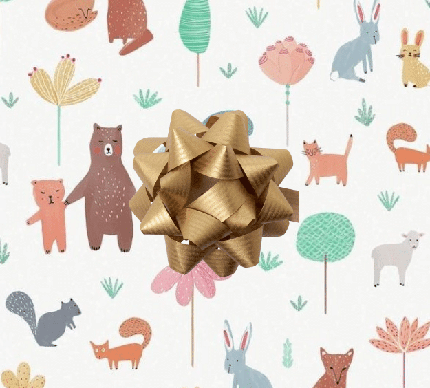image of a square of wrapping paper, the paper has a white background with lots of child friendly illustrations of animals such as bunnies, bears and bear cubs, cats and sheeep interspered with illustrated sheep, in the corner of the gift wrap paper is a light pink gift wrapping bow