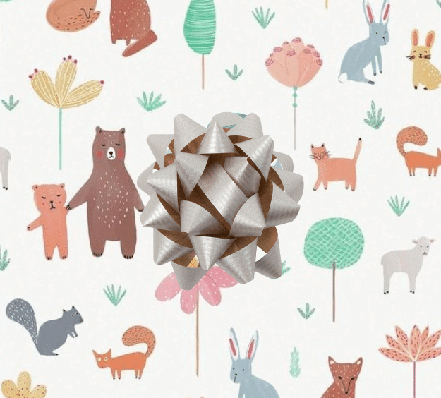 image of a square of wrapping paper, the paper has a white background with lots of child friendly illustrations of animals such as bunnies, bears and bear cubs, cats and sheeep interspered with illustrated sheep, in the corner of the gift wrap paper is a green gift wrapping bow