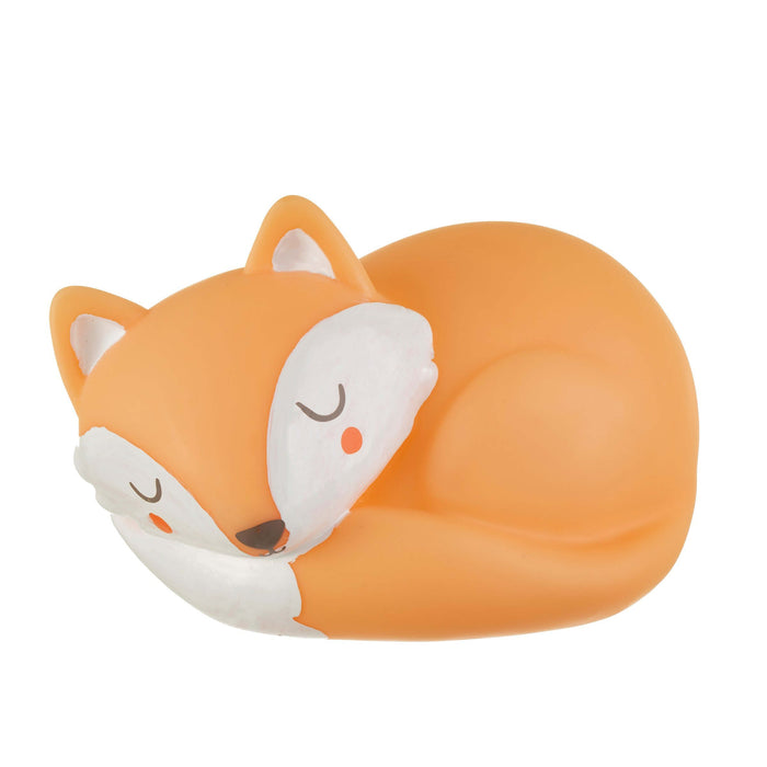 image of a childs nightlight in the shape of an orangey/brown and cream coloured friendly fox who has her eyes closed