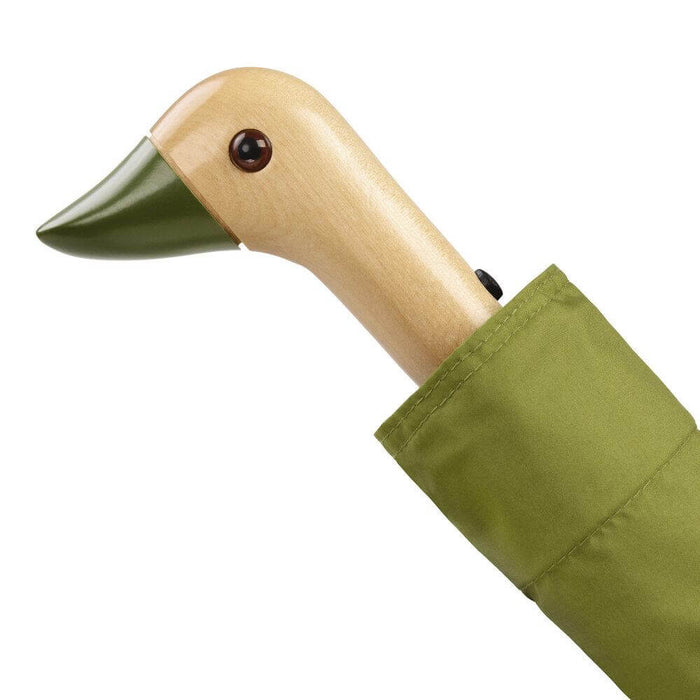 image of an umbreall whose handle is shaped like a friendly duck head, the umbrella is olive coloured