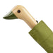 image of an umbreall whose handle is shaped like a friendly duck head, the umbrella is olive coloured